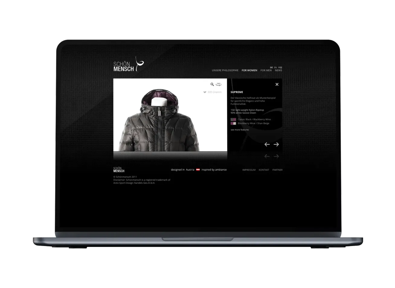 Laptop mit Ansicht der Schönmensch Website. Detailansicht einer Damenjacke